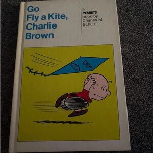 Go fly a kite Charlie Brown by Charles m Schultz